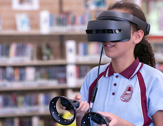 A teenage girl with 3D glasses watching the Energetica light show.