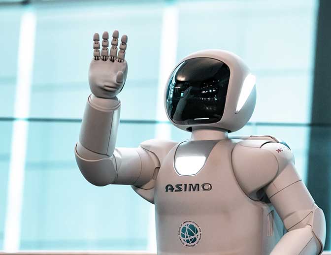 Robot Robi waving a hand, and welcome you to CSM.