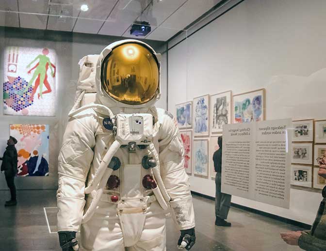 A spaceman in full space-costume.